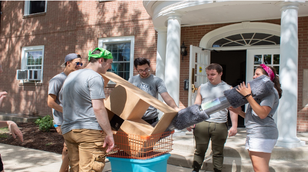 Students helping with move in